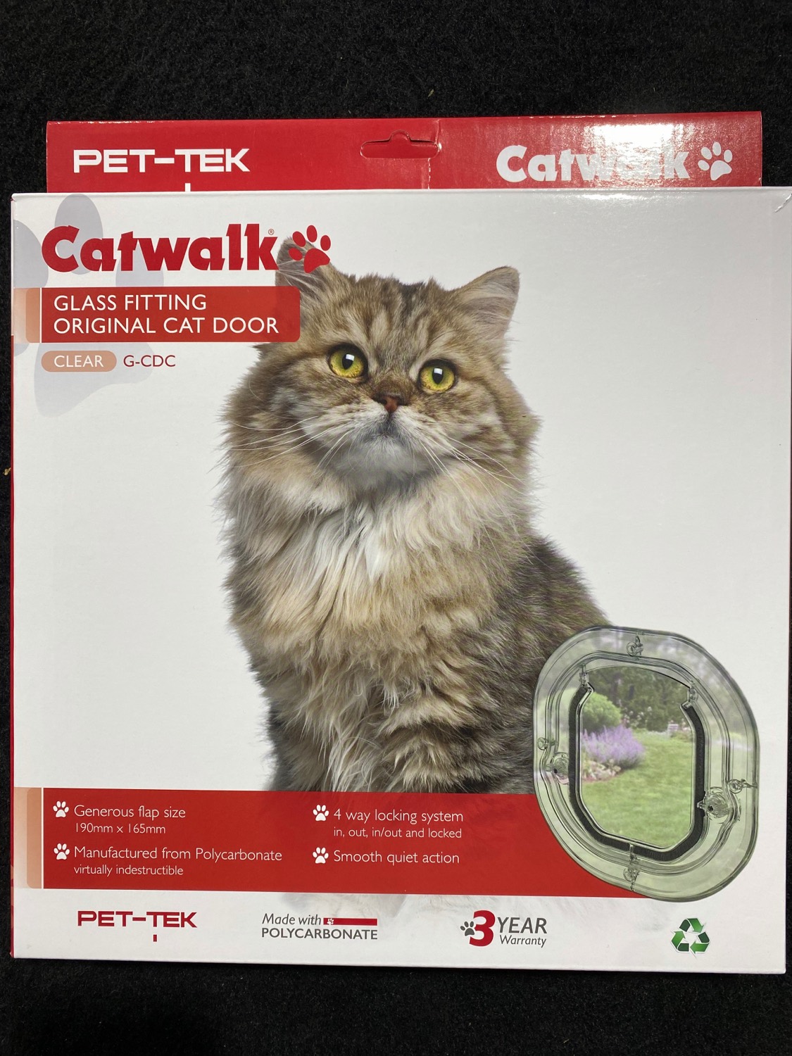 Original cat door installed into glass in Tauranga