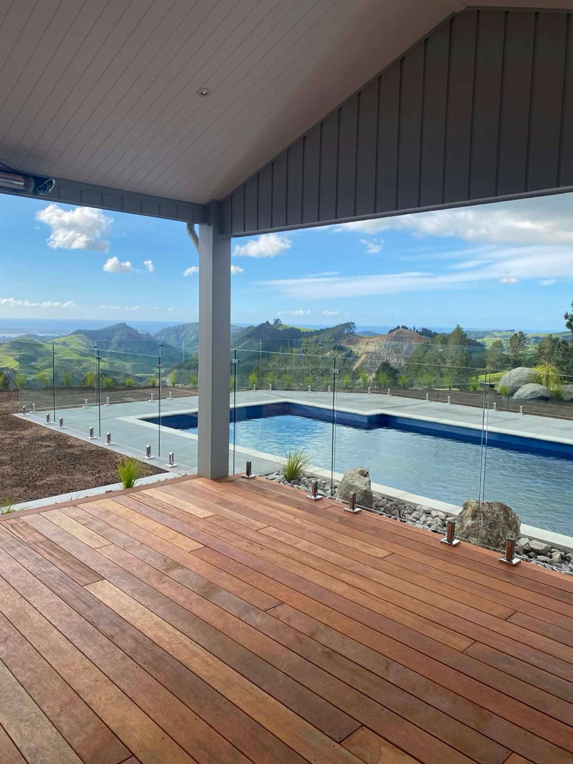 Glass pool fencing around a deck in Tauranga