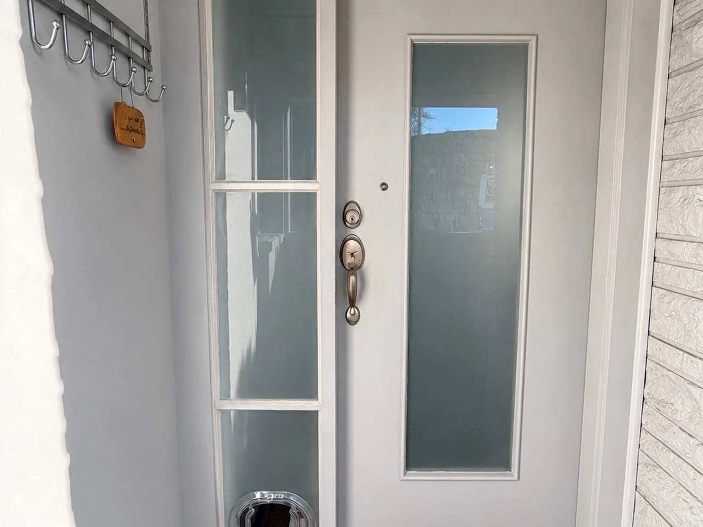 glazier checking a window at a tauranga rental property, landlord and tenant glass repair
