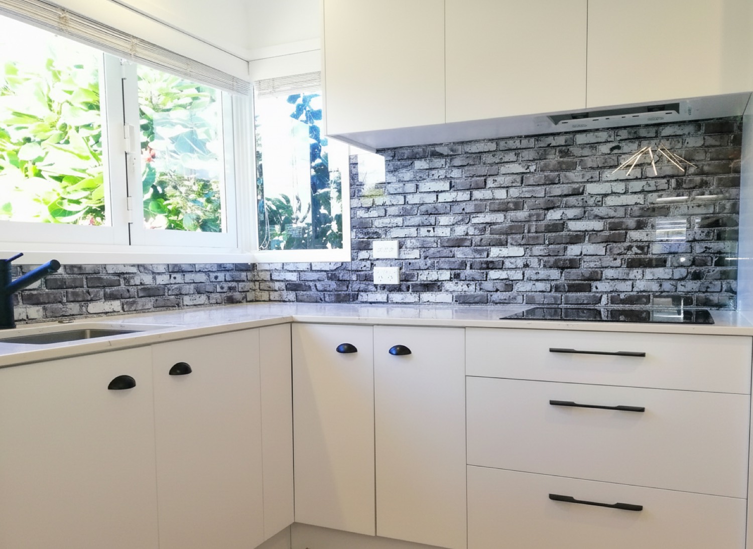 Black brick glass splashback in Tauranga